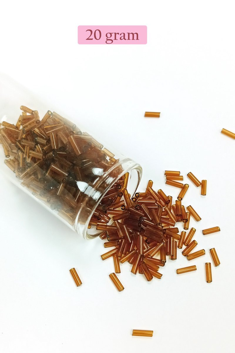 Uzun Boru Kesme Boncuk Çap 2mm Uzunluk 10 mm - 20 Gram - Şeffaf Kahverengi - BNC246